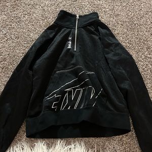 Nike half zip pullover. Has silver sprinkles all over. Lightly worn.